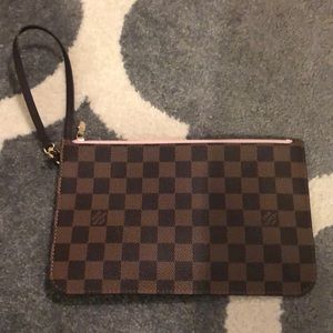 100% authentic Louis Vuitton wristlet.